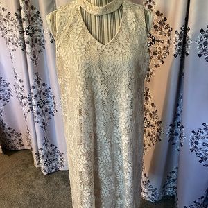 Perceptions, sleeveless with interest at the neckline.  Lined, beautiful dress.